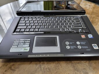 Prodám starší používaný zcela funkční laptop Asus X59SLserie - 3
