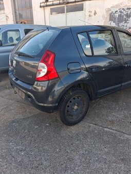 Sandero 1.4i veskere dily - 3