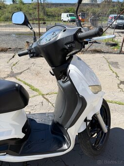 Peugeot Tweet 125 r. 2014 - 3