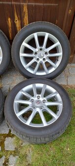 Letní sada originál alu Seat 5x112 R16 - 3