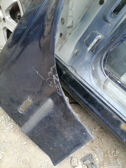 pravý přední blatník na Bmw e46 - 3