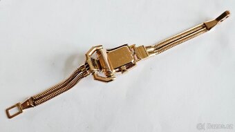 Zlatý náramek-hodinky zn. Omega s brilianty a rubíny 3,87ct. - 3