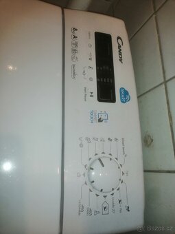Vrchem plněná pračka Candy CST-G832D-S - 3
