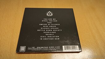 CD While she Sleeps - 3