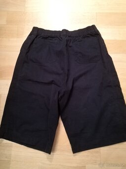 Prodloužené tmavomodré kraťasy do gumy, vel. 164 - 3