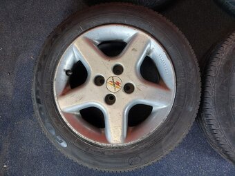 ALU disky 4x100 R15 7Jx15H2 ET 38 s letními pneu 185/65 R15 - 3