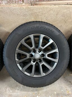 Alu kola Toyota Hilux 6x139,7 R18 ET25 + zimní pneu 265/60R1 - 3