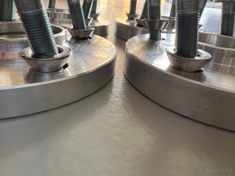 PODLOŽKY: (4x100) šířka 15 a 20mm s náběhem st. kol 59,1mm - 3