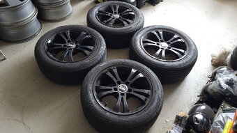 Černá letní ALU kola 16" 5x112 Passat B6/B7 - 3