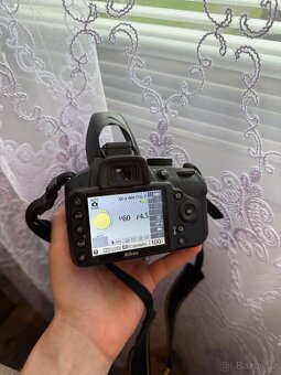 Nikon D3200 tělo + objektiv 18-55 mm + nabíječka - 3