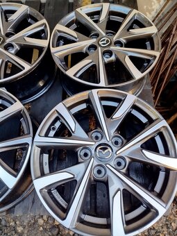 ALU originál Mazda 5x114,3 R16 6,5J ET 50 střed 67mm - 3