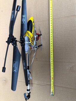 Dva modely RC vrtulníků na ND - 3