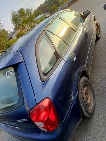Náhradní díly na -Mazda 323 F 1.6 - - barva modrá - rok reg - 3