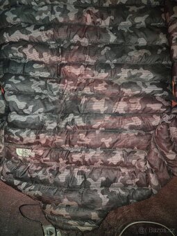 The North Face perova bunda vel .L stav 8/10 ,stav viz f - 3
