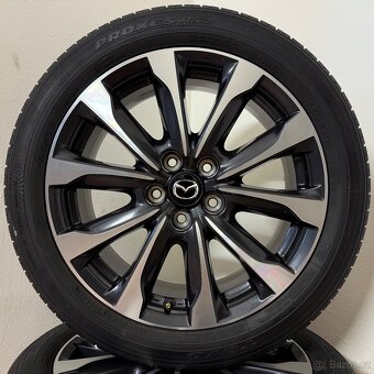 MAZDA CX-3 5x114,3 R18 ET50+LETNÍ 215/50R18 6,5mm - 3