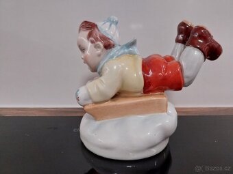 Chlapec na sáňkách - 3