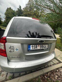 Kia carens - 3