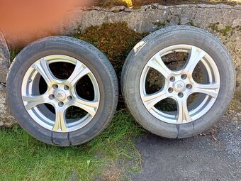 Alu kola s pneu 215/60 R17. - 3
