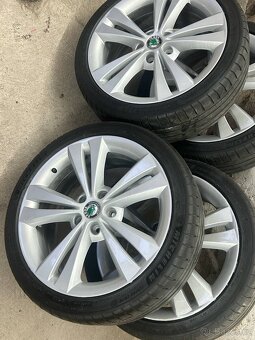 Originál alu kola Škoda Neptune R18 5x112 et51 - 3