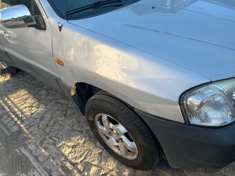 Mazda tribute 2.0 benzin 2004 - 3