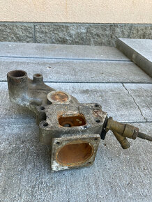 Těleso vodní pumpy OCTAVIA, FELICIA s ventilem topení - 3