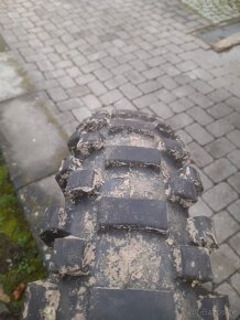 Drapak 110/90-17" - 3