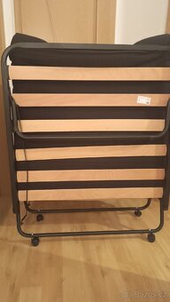 Skládací postel DAMSBRO 90×200 černá

(97) - 3