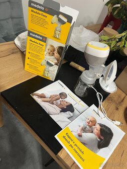 Elektronická odsávačka mléka Medela nová - 3