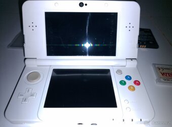 3DS New EU + nahrádní díly.. - 3
