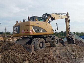 Caterpillar M313D - 3