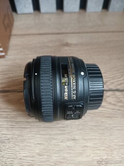 Nikkor 50mm f/1.8 + UV filtr - 3