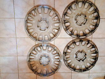 Poklice Opel Corsa 14" original - 3