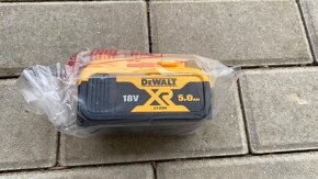 Nová nepoužitá AKU baterie DeWalt DCB 184 - 3