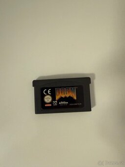 Game Boy Advance (modrý průhledný) + originální hra DOOM - 3