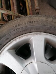 Prodám kola Ford K 185/60 r14 - 3