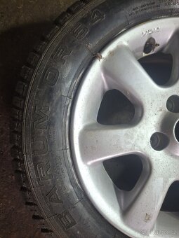 Prodám dvě kola 175/70 R14 4X100 - 3