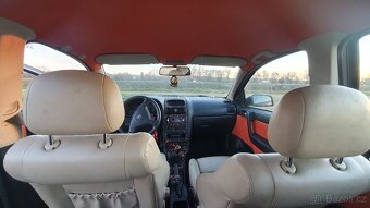 Interiér Opel astra G bertone - 3