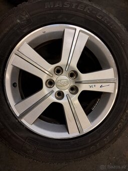 Subaru ALU Kola 6,5Jx16 ET48 Zimní 215/65/16 (Z263) - 3