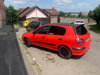 Nissan Almera N16 hatchback - 3