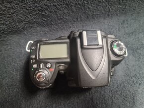 Nikon D90 poškozený - 3