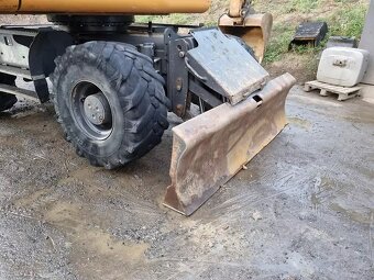 CASE WX 148 kolové rypadlo 16,5 t - 3