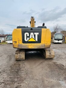 Pásové rypadlo Caterpillar 320W - 3