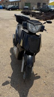 Skutr kymco 250 - 3