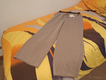 Nove damske teplaky v. L - 3