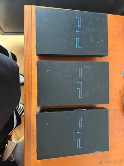 PS2- fat a slim - 3