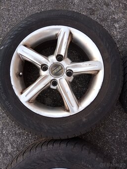 Sada zimních alu kol na Ford - 185x60R-14. - 3