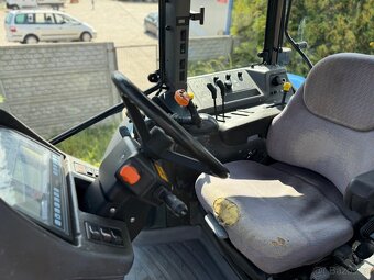 Zemědělský traktor New Holland TM 190, rok výroby 2006. Míst - 3