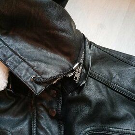 Teplá bunda z umělé kůže velikost je 44 - 3