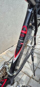 trekingové kolo Kellys Axis CRX Cross – hliníkový rám 21" - 3