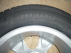 Lité kolo Ronal 1148 - 6,5Jx15H2 ET50 + PNEU 205/60 R15 - 3